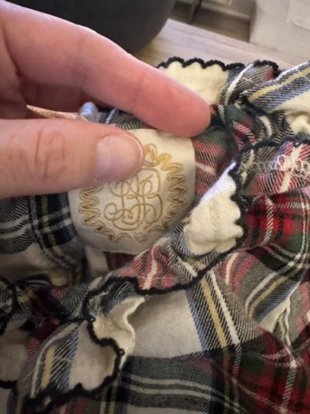 The Beaufort Bonnet Company. Plaid flannel onesie with ruffle collar. Size 12-18